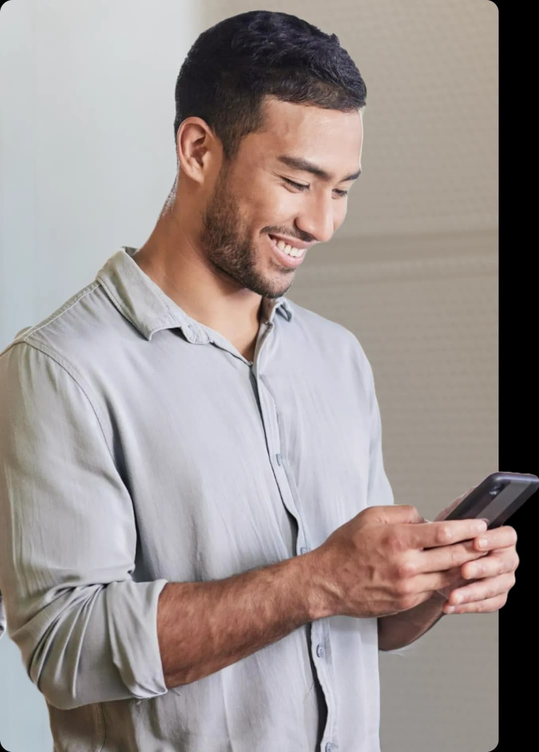 A man sending funds on his phone