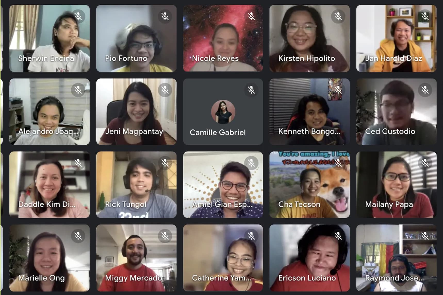 A group of people standing in front of a sign.